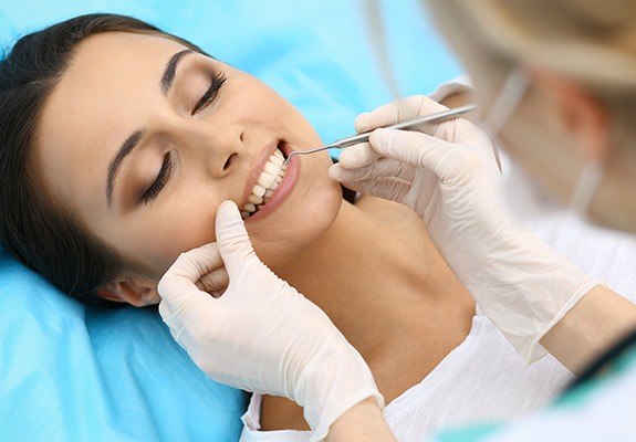 Dental patient receiving a dental exam