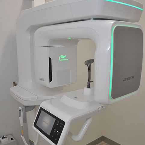 3 D C T scanner standing against wall