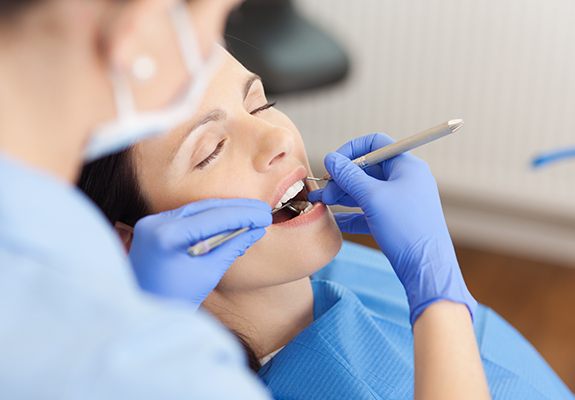 Relaxed patient receiving dental care