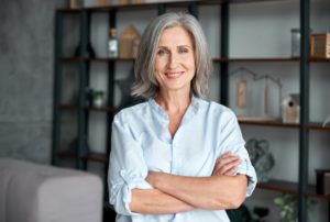 older woman with dental implants in Washington, D.C.